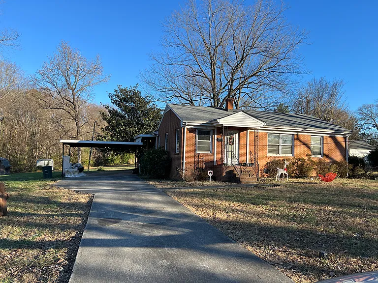 1002 Sykes Ave 3 BR, 1.5 Ba, LR, Den, 
New roof, architectural shingles. Large pecan tree and magnolia. Carport, two-car parking pad, Extra lot.