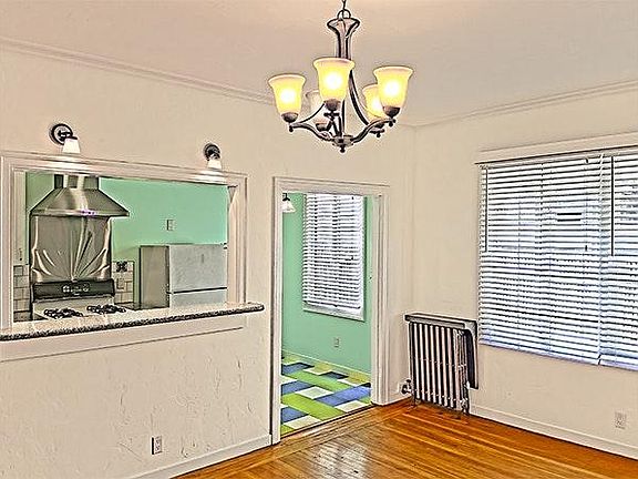 living room looking into eat in kitchen