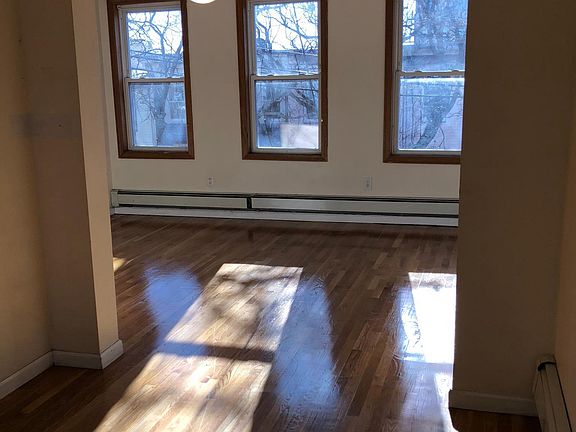 3 large sun-filled windows in the living room. Fresh Paint a