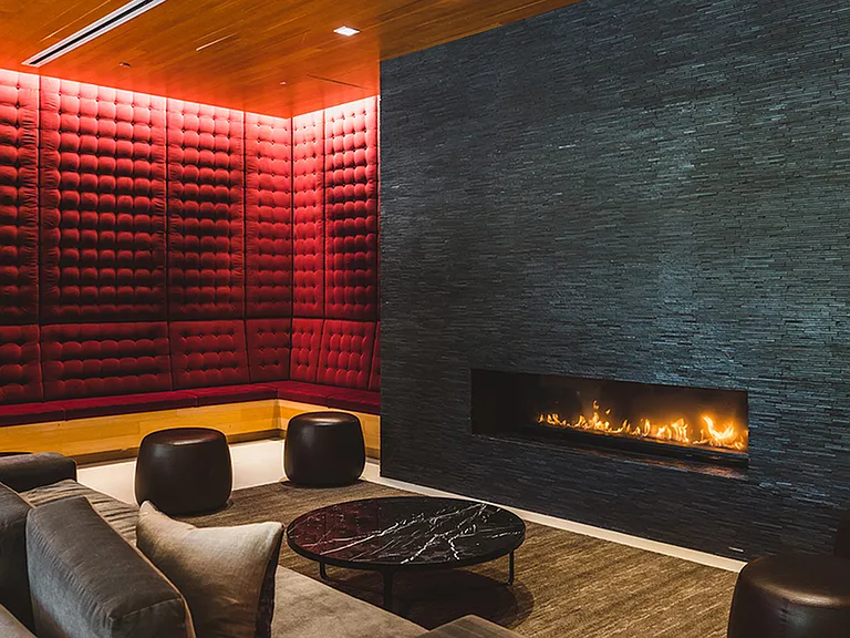 Take in a quiet conversation or a game night around the fire in this clubroom