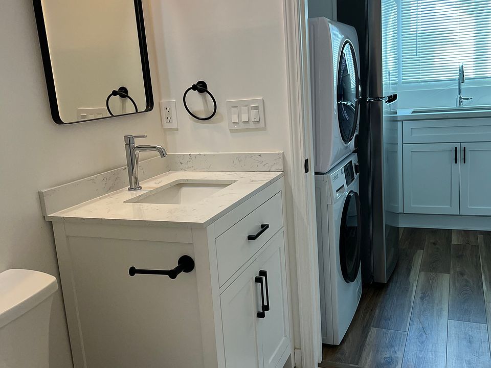 Bathroom looking out to the kitchen.