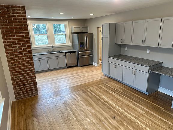 Full Dining Room and Kitchen Area