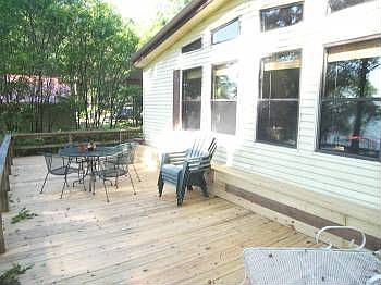 Large deck facing water 