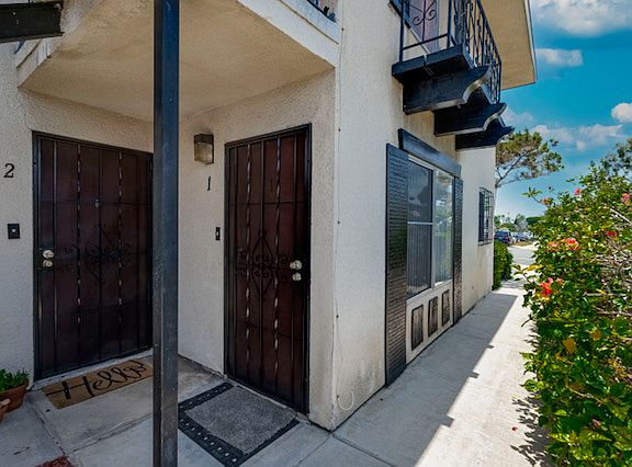 Unit 1 entry door on right