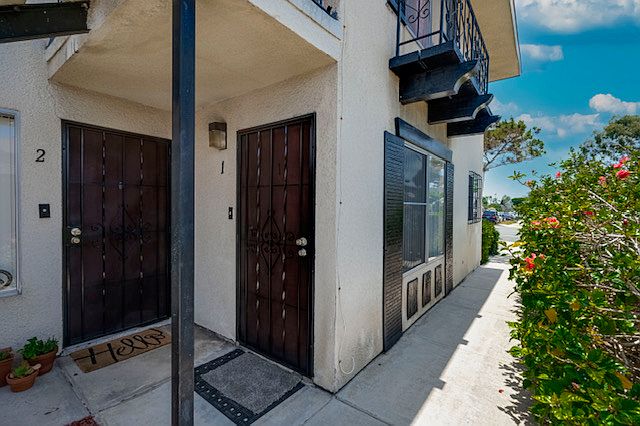 Unit 1 entry door on right