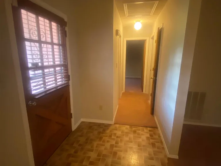 Foyer and Hallway to Bedrooms 2 and 3