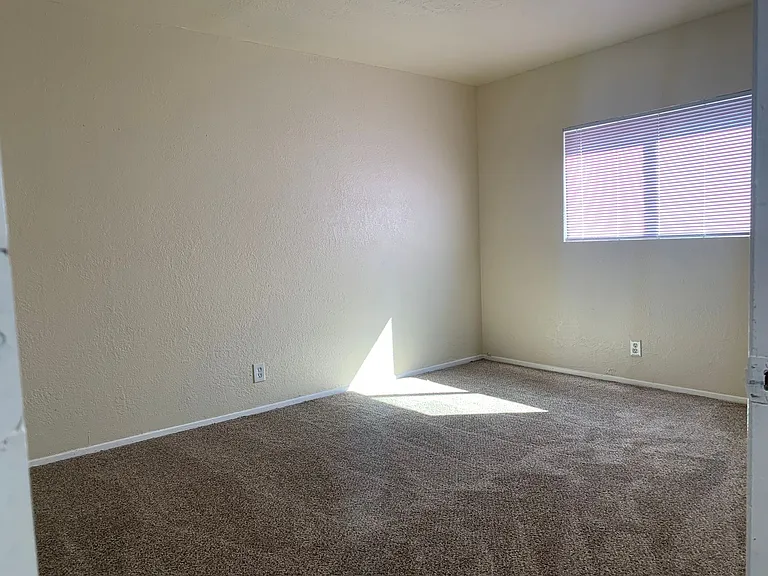 Adorable Fourplex Nestled in Four Hills — Photo 8