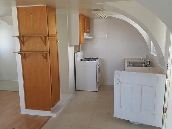 unique architecture makes for a charming kitchen