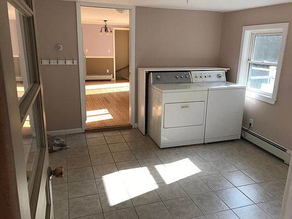 Mudroom with upstairs Laundry leading into kitchen