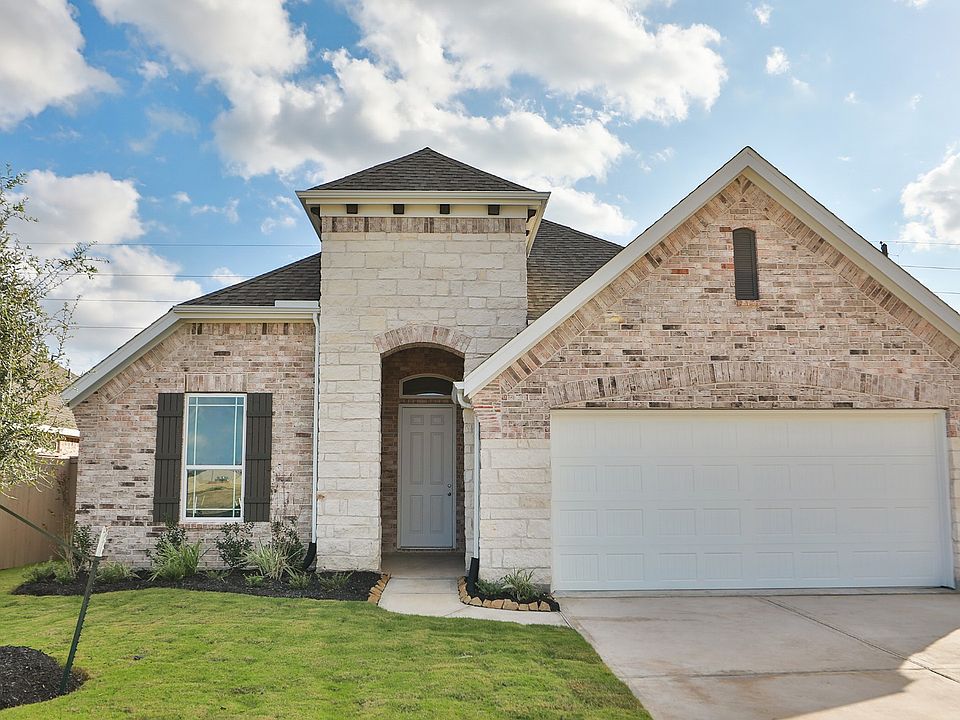 Exquisite stone facade and brickwork define this suburban masterpiece s architectural elegance.