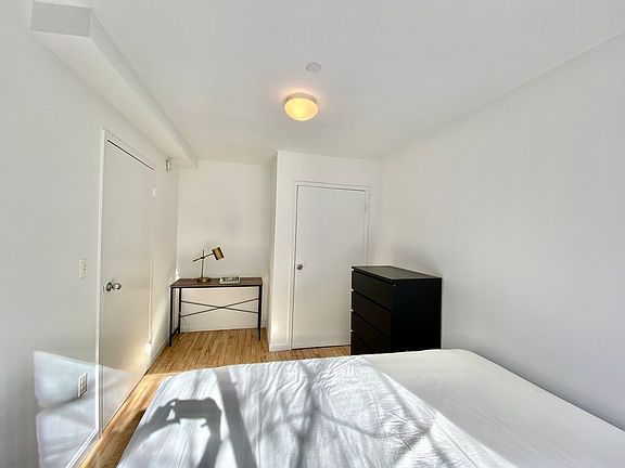 5th image of 319 E 8th St APT 3