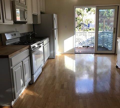 3rd Fl. Kitchen looking out to deck
