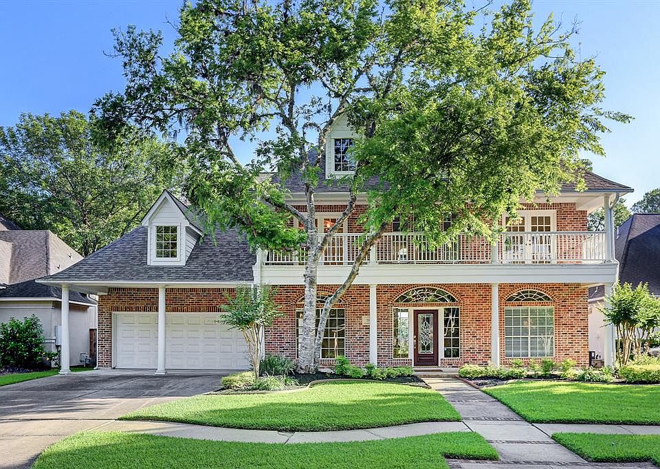 Pristine Mitchell-Carroll Custom built home located in the Shores of Greatwood, nestled along the 9th hole Golf Course