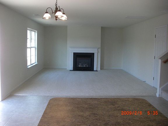 View  from kitchen at island into Great Room
