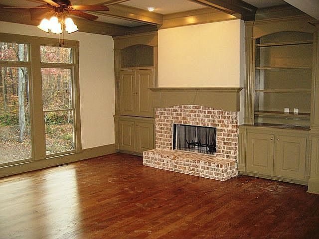 Family room w/ fireplace and built ins 