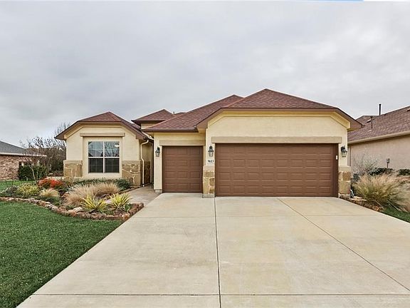 THIS HOME FEATURES EXTENSIVE CUSTOM LANDSCAPING, WITH AN OVER SIZED 2 CAR GARAGE PLUS AN EXTRA BAY PERFECT FOR STORAGE OR A GOLF CART!