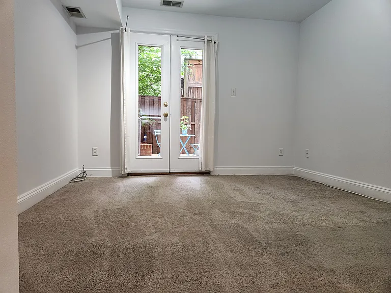 Bedroom with access to the private patio.