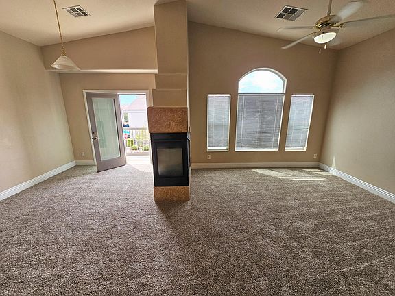 Living room/dining room with door to balcony.