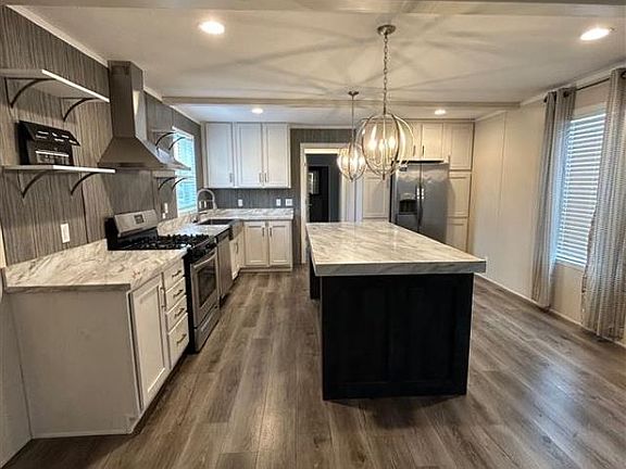 4th image of 875 W Grand River Ave Lot 98