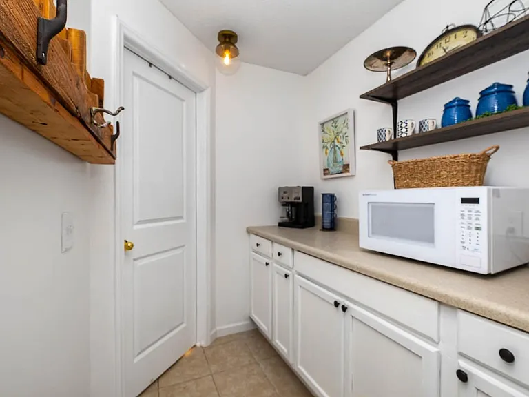 Butlers pantry holds the additional bakeware, instant pot, slow cooker, blender, salad spinner, etc.