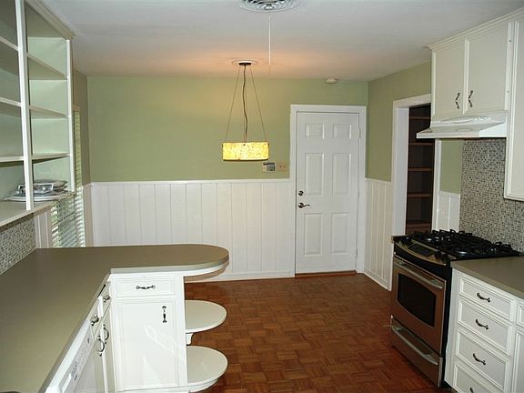 New counters and glass tile backsplash
