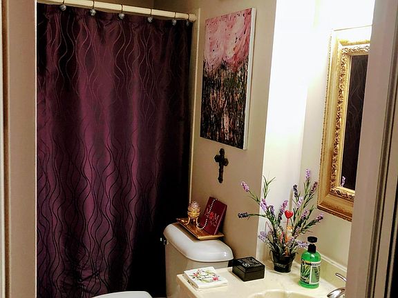 Beautifully decorated bathroom with lovely fixtures. 