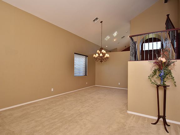 Grand entrance with vaulted ceilings