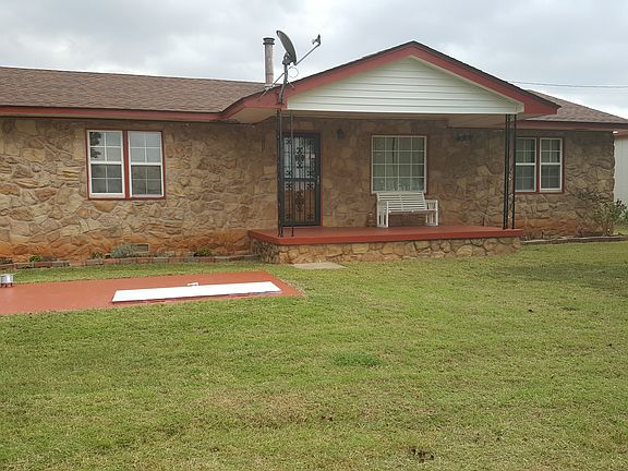 Front of home, storm shelter