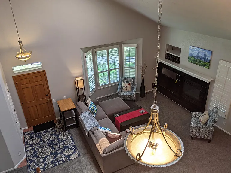Vaulted soaring ceilings of spacious living room.