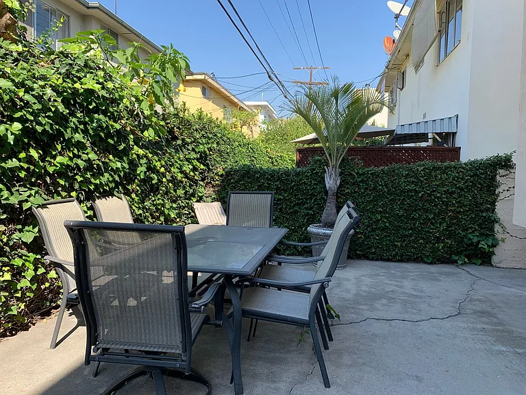 Shared back patio for tenant use.