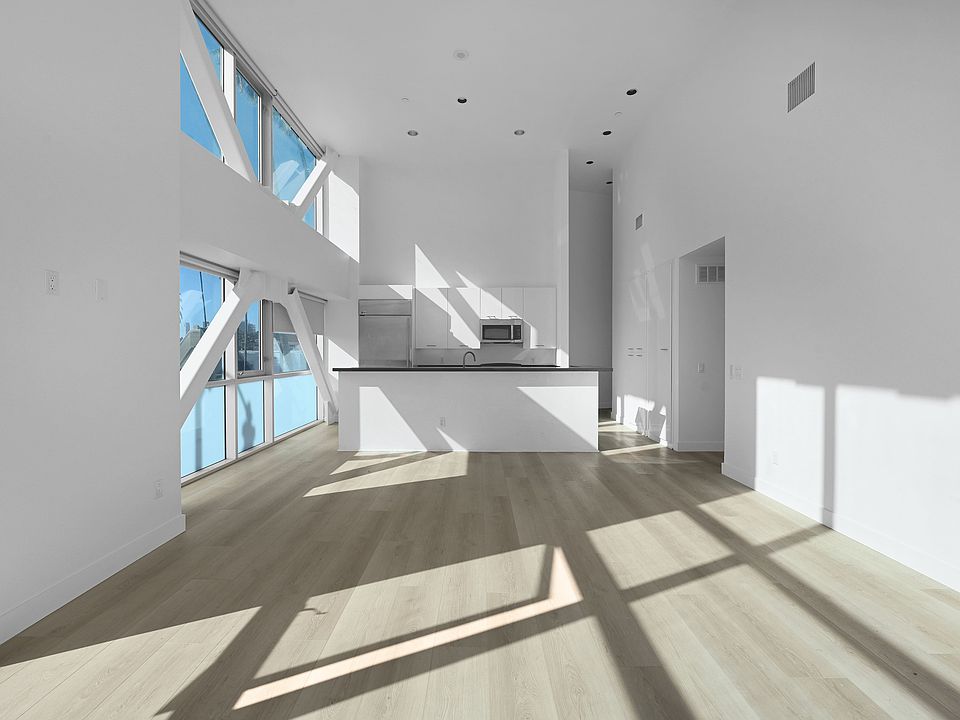 Experience the elegance of this airy loft apartment with stunning natural light.