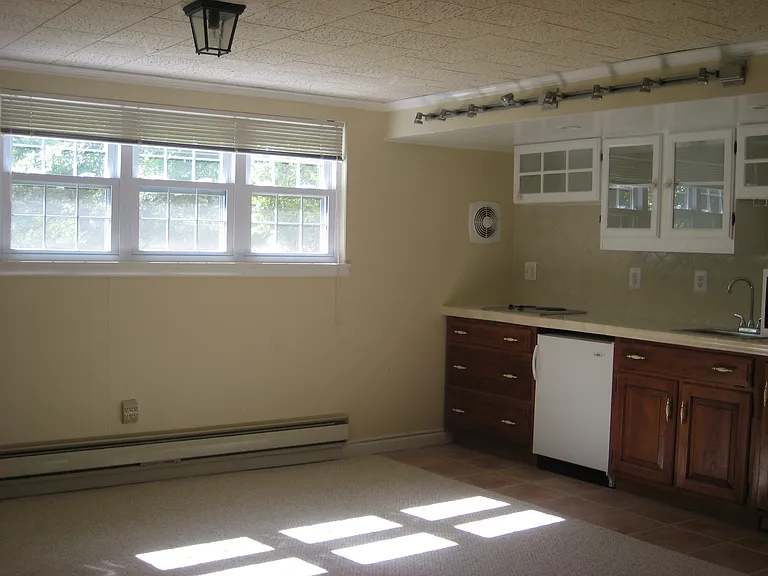 Great Room w/ kitchenette. Windows. Sunny.