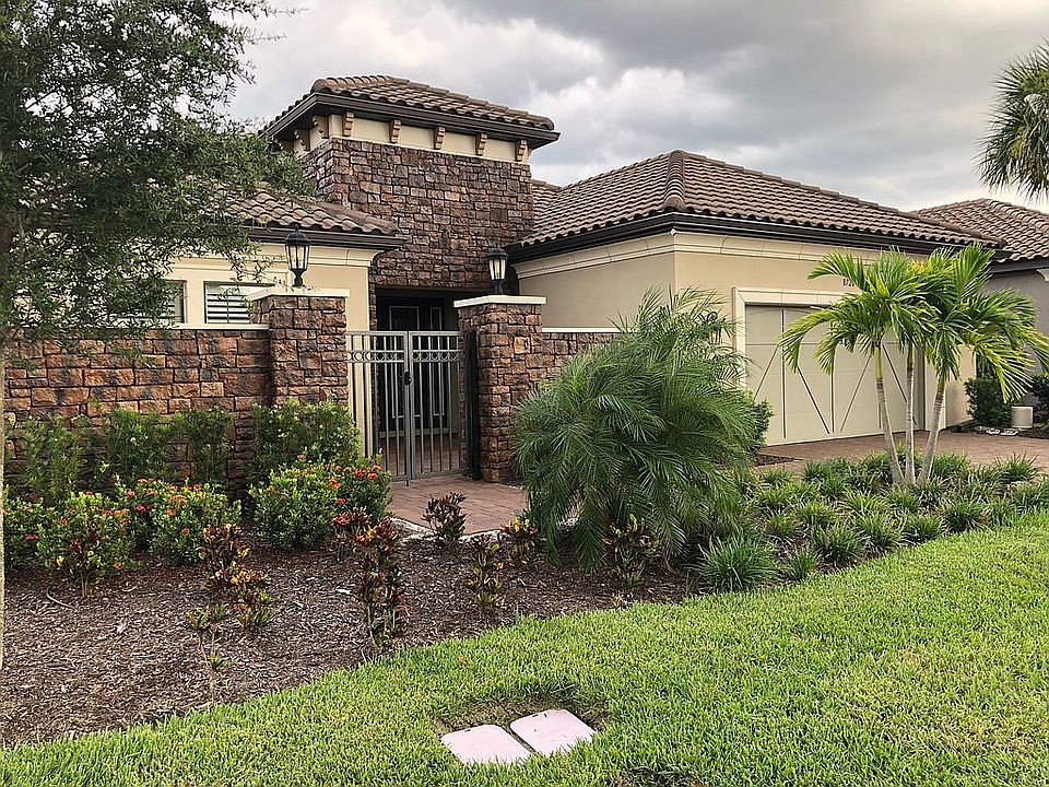 Front brick gated courtyard