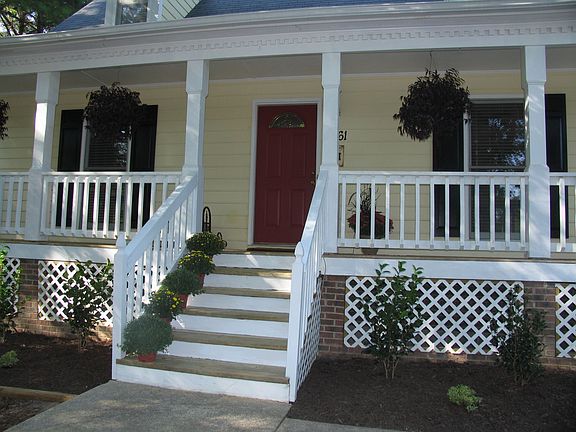 Relax on this wonderful rocking chair front porch!