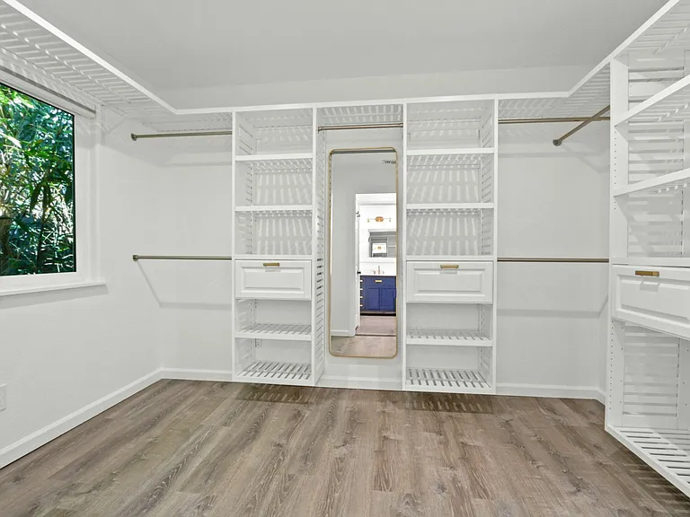 Primary Bedroom walk-in closet