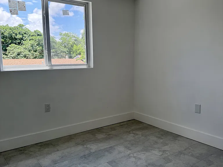 147 NW 59th St — Photo 19