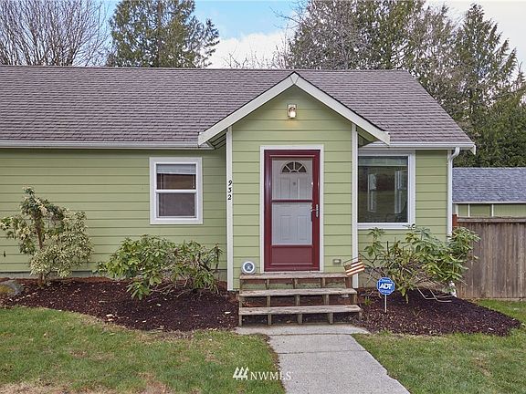 Front walkway into home. Updated landscaping. Hardi-Plank siding. 