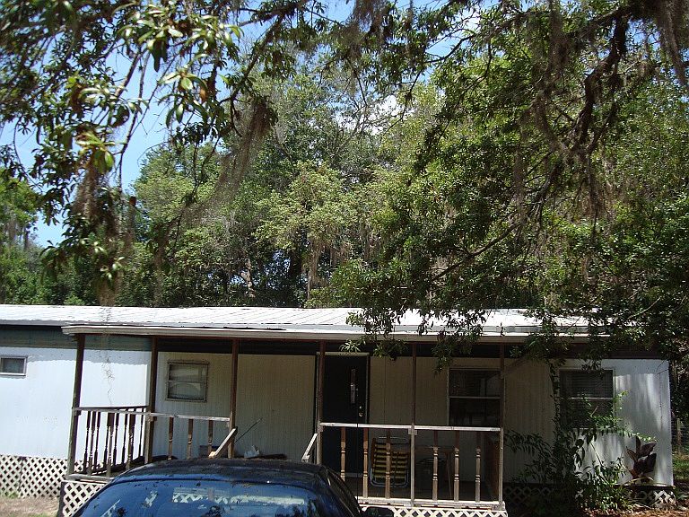 front of home shows porch 