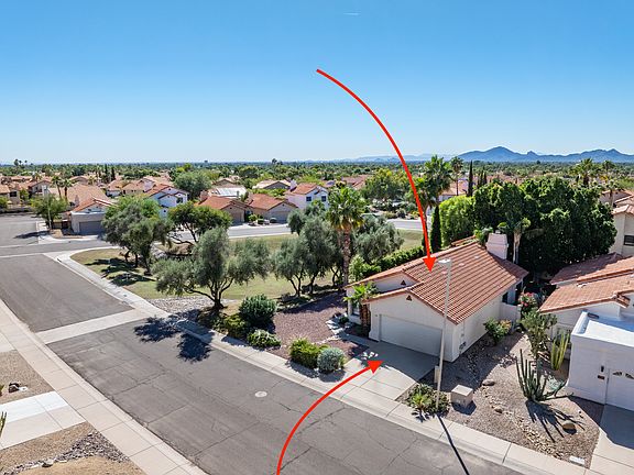aerial view of property, 2 car garage