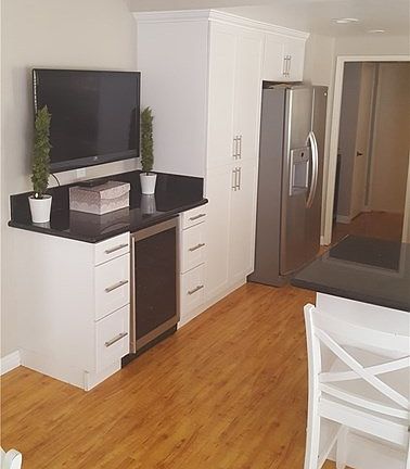 TV and Wine Fridge STAY with the house!