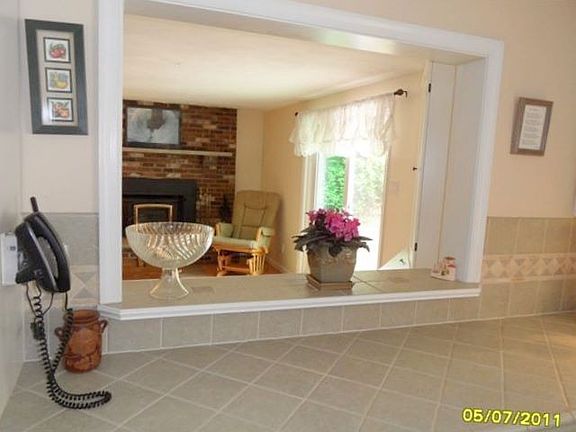 KITCHEN OVERLOOKS FAMILY ROOM