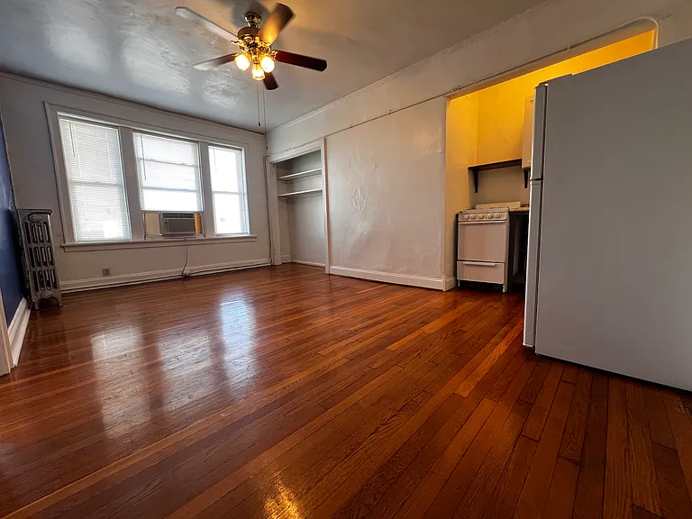 Featuring gleaming hardwood floors, tall ceilings, and a practical open layout, this one bedroom offers an inviting place to call home.