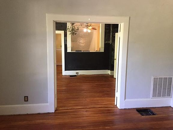 Living Room looking into dining room and kitchen
