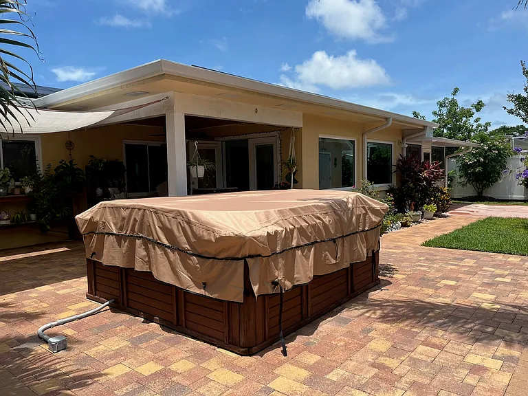 Hot tub view onto back of house