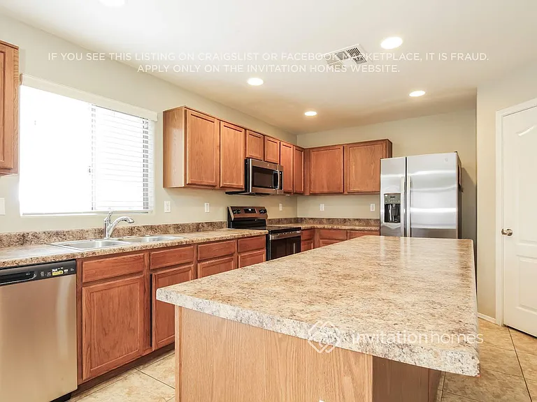12047 W Salter Dr — Photo 6