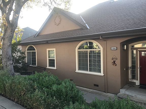 From driveway + front door 