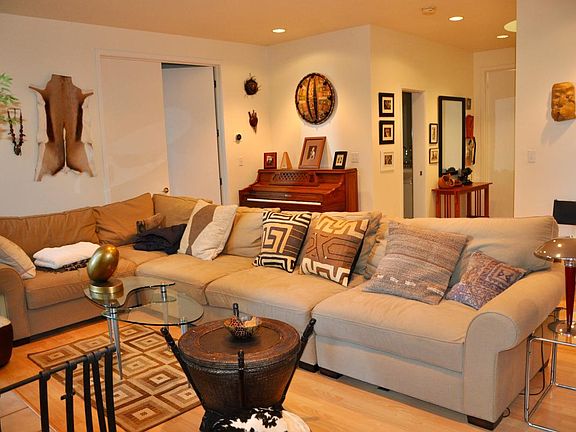 Living room with entrance to office/guest bedroom