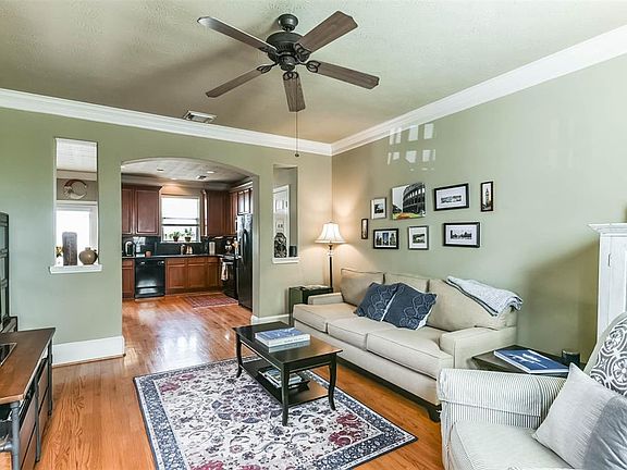 Beautiful hardwood floors welcome you to the open concept living, kitchen and dining rooms.