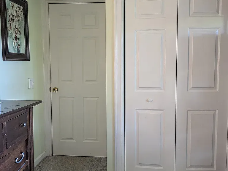 Bedroom 1 facing north, primary exit faces to hallway