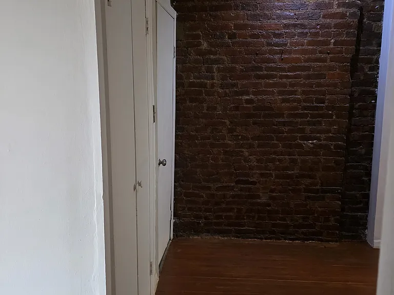 Closet doors to the left.